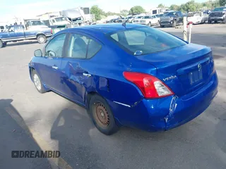2012 Nissan Versa SV with VIN 3N1CN7AP2CL864464, listed as a IAAI auction lot 42571245 with 180,268 mi miles and . Bid and sale history available at DreamBid. Image 3.