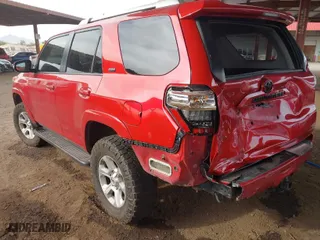 2015 Toyota 4Runner Limited with VIN JTEBU5JRXF5248819, listed as a IAAI auction lot 41197577 with 143,500 mi miles. Bid and sale history available at carsss.com. Image 3.
