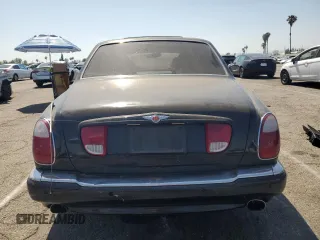 2001 Bentley Arnage z VIN SCBLC31E81CX05759, wystawiony jako Copart lot #56231445 z przebiegiem Nie podano mil oraz Tytuł czysty. Historia ofert i sprzedaży dostępna na DreamBid. Obrazek 6.