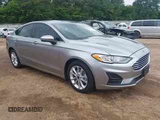 2020 Ford Fusion SE z VIN 3FA6P0LU4LR148070, wystawiony jako IAAI lot #42262446 z przebiegiem 69 057 mil mil oraz . Historia ofert i sprzedaży dostępna na DreamBid. Obrazek 1.