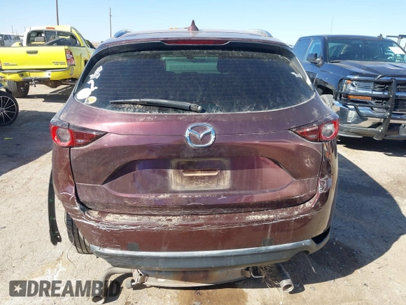 2019 Mazda CX-5 Sport with VIN JM3KFABM2K0686372, listed as a IAAI auction lot 41770183 with 57,202 mi miles and . Bid and sale history available at DreamBid. Image 16.