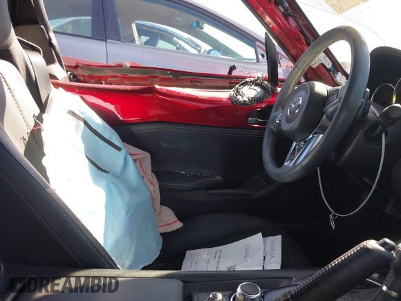 2021 Mazda MX-5 Miata Grand Touring с VIN JM1NDAM71M0459437, выставлен на аукционе IAAI как лот 41808704 с пробегом 19 368 миль миль и . История ставок и продаж доступна на DreamBid. Изображение 20.
