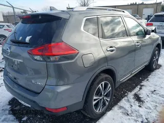 2017 Nissan Rogue SL with VIN JN8AT2MV7HW271485, listed as a IAAI auction lot 41100772 with 106,965 mi miles. Bid and sale history available at carsss.com. Image 4.