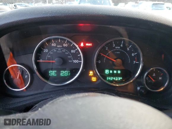 2015 Jeep Wrangler Willys Wheeler with VIN 1C4AJWAG9FL543998, listed as a Copart auction lot 88947025 with 142,433 mi miles and Salvage title. Bid and sale history available at DreamBid. Image 9.
