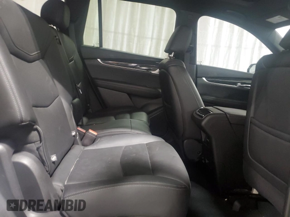 2023 Cadillac XT6 AWD Premium Luxury z VIN 1GYKPDRS6PZ129957, wystawiony jako Copart lot #58808245 z przebiegiem Nie podano mil oraz Czysty tytuł • Clean title. Historia ofert i sprzedaży dostępna na DreamBid. Obrazek 11.