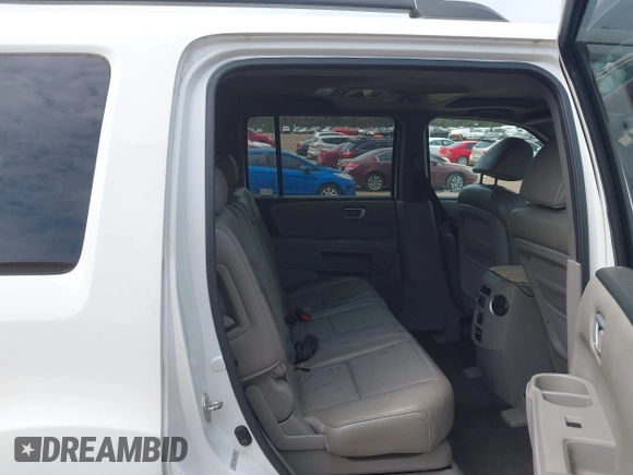 2011 Honda Pilot EX-L with VIN 5FNYF3H64BB027265, listed as a IAAI auction lot 41901424 with 198,556 mi miles and . Bid and sale history available at DreamBid. Image 8.
