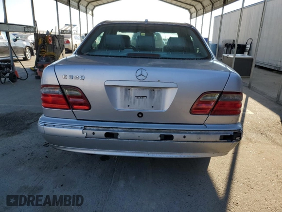2002 Mercedes-Benz E-Class with VIN WDBJF65J12B488632, listed as a Copart auction lot 87060504 with 273,135 mi miles and Salvage Title. Bid and sale history available at carsss.com. Image 6.