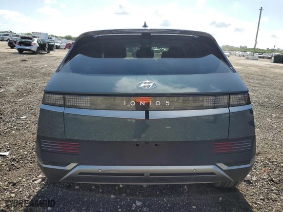 2023 Hyundai IONIQ 5 SE Standard Range with VIN KM8KM4AB4PU186452, listed as a Copart auction lot 52973244 with 5,673 mi miles and Non Repairable. Bid and sale history available at carsss.com. Image 6.