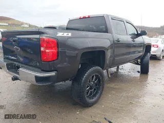 2015 Chevrolet Silverado 1500 LT with VIN 3GCUKRECXFG104194, listed as a IAAI auction lot 41029090 with 149,530 mi miles. Bid and sale history available at carsss.com. Image 4.