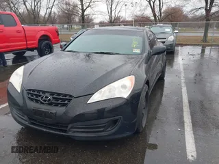 2011 Hyundai Genesis Coupe with VIN KMHHT6KD6BU056612, listed as a IAAI auction lot 41872721 with 143,137 mi miles and . Bid and sale history available at DreamBid. Image 2.