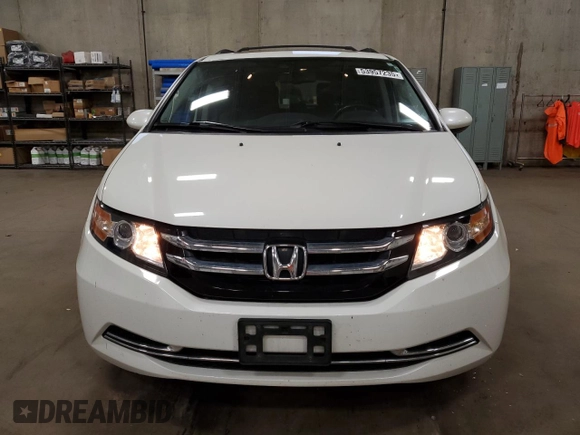 2016 Honda Odyssey EX-L with VIN 5FNRL5H67GB090747, listed as a Copart auction lot 53957235 with 131,464 mi miles and Salvage Title. Bid and sale history available at DreamBid. Image 5.