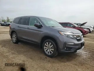 2020 Honda Pilot EX-L with VIN 5FNYF5H57LB006558, listed as a Copart auction lot 55172095 with 58,863 mi miles and Salvage title. Bid and sale history available at DreamBid. Image 4.