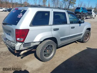 2005 Jeep Grand Cherokee Laredo with VIN 1J4HR48N65C595873, listed as a IAAI auction lot 41715998 with 145,689 mi miles. Bid and sale history available at carsss.com. Image 4.