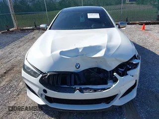 2022 BMW 8 Series M850i with VIN WBAGV8C09NCH15245, listed as a IAAI auction lot 42053154 with 26,384 mi miles and . Bid and sale history available at DreamBid. Image 12.