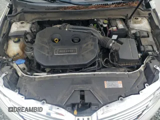 2015 Lincoln MKZ z VIN 3LN6L2G95FR626407, wystawiony jako Copart lot #63658825 z przebiegiem 121 361 mil mil oraz Szkoda całkowita • Salvage title. Historia ofert i sprzedaży dostępna na DreamBid. Obrazek 11.
