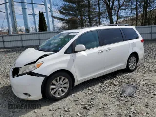 2011 Toyota Sienna XLE with VIN 5TDDK3DC1BS010411, listed as a Copart auction lot 51213065 with 174,214 mi miles and Salvage title. Bid and sale history available at DreamBid. Image 1.