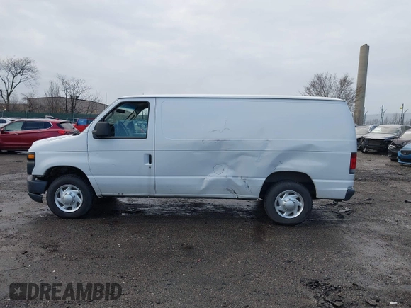 2013 Ford Econoline Cargo Commercial with VIN 1FTNE1EW2DDB11061, listed as a IAAI auction lot 41808318 with 230,677 mi miles. Bid and sale history available at carsss.com. Image 13.