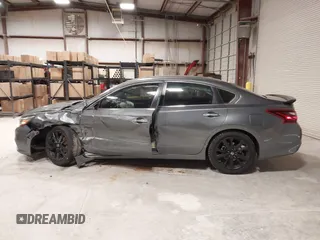 2018 Nissan Altima 2.5 SR with VIN 1N4AL3AP1JC203798, listed as a IAAI auction lot 41853789 with 77,875 mi miles. Bid and sale history available at carsss.com. Image 14.