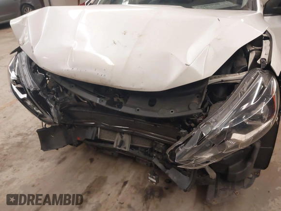 2016 Nissan Sentra SV with VIN 3N1AB7AP9GY331777, listed as a IAAI auction lot 41053179 with 152,017 mi miles and . Bid and sale history available at DreamBid. Image 6.