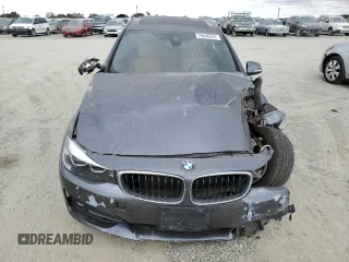 2018 BMW 3 Series 330i xDrive with VIN WBA8Z9C57JB219965, listed as a Copart auction lot 76536574 with 0 mi miles and Salvage Title. Bid and sale history available at carsss.com. Image 5.