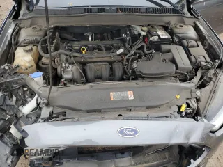 2015 Ford Fusion SE z VIN 1FA6P0H76F5124847, wystawiony jako Copart lot #58311485 z przebiegiem Nie podano mil oraz Tytuł czysty. Historia ofert i sprzedaży dostępna na DreamBid. Obrazek 11.