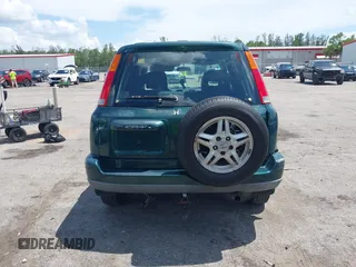 2000 Honda CR-V SE z VIN JHLRD1870YS009867, wystawiony jako IAAI lot #42399220 z przebiegiem 254 367 mil mil oraz . Historia ofert i sprzedaży dostępna na DreamBid. Obrazek 16.