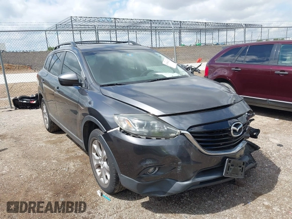 2015 Mazda CX-9 Touring with VIN JM3TB2CA7F0460232, listed as a IAAI auction lot 42344122 with 103,478 mi miles and . Bid and sale history available at DreamBid. Image 1.