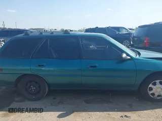 1997 Ford Escort LX z VIN 3FALP15P7VR158272, wystawiony jako IAAI lot #41833216 z przebiegiem 148 170 mil mil oraz . Historia ofert i sprzedaży dostępna na DreamBid. Obrazek 12.