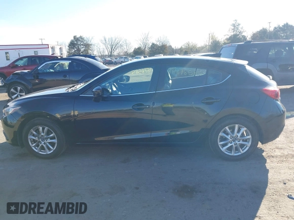 2014 Mazda 3 i Grand Touring with VIN JM1BM1M70E1211906, listed as a IAAI auction lot 41878585 with 112,013 mi miles and . Bid and sale history available at DreamBid. Image 14.