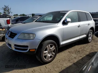 2004 Volkswagen Touareg with VIN WVGCM77L44D054387, listed as a Copart auction lot 56009024 with 182,816 mi miles and Salvage Title. Bid and sale history available at DreamBid. Image 1.