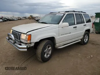 1998 Jeep Grand Cherokee Limited with VIN 1J4GZ88Z4WC164505, listed as a Copart auction lot 76843304 with 0 mi miles and Salvage Title. Bid and sale history available at carsss.com. Image 1.