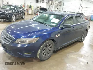 2011 Ford Taurus SE with VIN 1FAHP2DW4BG187235, listed as a IAAI auction lot 41942952 with 162,083 mi miles. Bid and sale history available at carsss.com. Image 2.