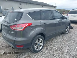 2013 Ford Escape SE with VIN 1FMCU0GX3DUC84979, listed as a IAAI auction lot 42067695 with 162,447 mi miles and . Bid and sale history available at DreamBid. Image 4.