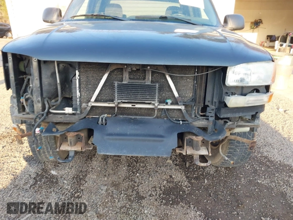 2004 GMC Sierra 1500 SLE z VIN 2GTEK13T041435042, wystawiony jako IAAI lot #41777775 z przebiegiem 218 745 mil mil oraz . Historia ofert i sprzedaży dostępna na DreamBid. Obrazek 6.