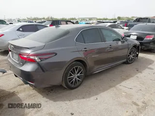 2023 Toyota Camry SE with VIN 4T1G11AK3PU721350, listed as a IAAI auction lot 41835561 with 102,237 mi miles and . Bid and sale history available at DreamBid. Image 4.