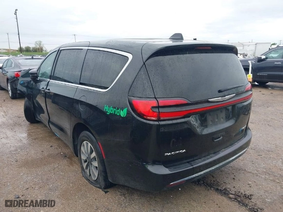2023 Chrysler Pacifica Hybrid Touring L with VIN 2C4RC1L71PR554435, listed as a IAAI auction lot 41901500 with 53,373 mi miles. Bid and sale history available at carsss.com. Image 3.