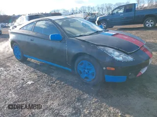2000 Toyota Celica GT with VIN JTDDR32TXY0061397, listed as a IAAI auction lot 41264249 with 256,280 mi miles. Bid and sale history available at carsss.com. Image 1.