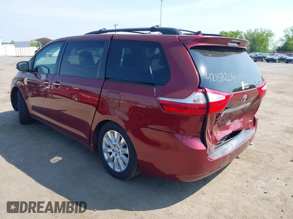 2015 Toyota Sienna XLE with VIN 5TDYK3DC6FS593937, listed as a IAAI auction lot 42168204 with 136,059 mi miles and . Bid and sale history available at DreamBid. Image 3.