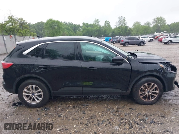 2021 Ford Escape SE with VIN 1FMCU9G67MUA23303, listed as a IAAI auction lot 42232319 with 12,694 mi miles and . Bid and sale history available at DreamBid. Image 13.