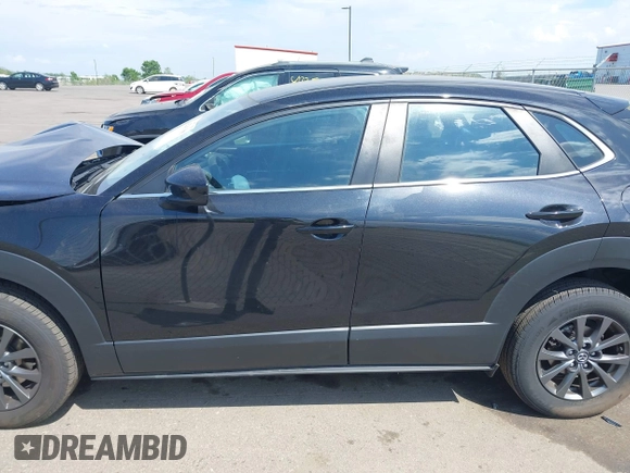 2021 Mazda CX-30 S with VIN 3MVDMBAL0MM254030, listed as a IAAI auction lot 42261180 with 72,459 mi miles and . Bid and sale history available at DreamBid. Image 14.