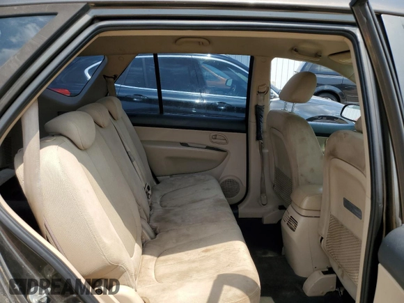 2009 Kia Rondo LX Base with VIN KNAFG528697266422, listed as a Copart auction lot 65730474 with 175,649 mi miles and Non Repairable. Bid and sale history available at carsss.com. Image 11.