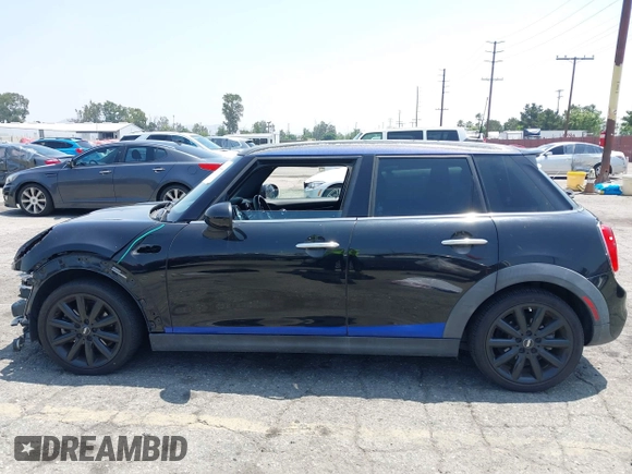 2015 MINI Hardtop 4 Door S with VIN WMWXU3C58F2B66601, listed as a IAAI auction lot 42444404 with 76,174 mi miles and . Bid and sale history available at DreamBid. Image 15.