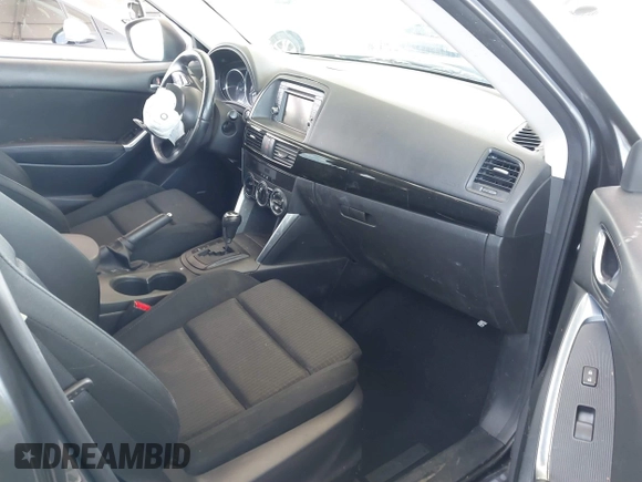 2014 Mazda CX-5 Touring with VIN JM3KE2CY9E0384401, listed as a IAAI auction lot 41699913 with 75,301 mi miles. Bid and sale history available at carsss.com. Image 5.