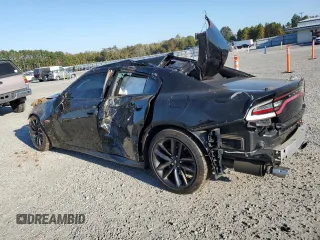 2019 Dodge Charger Scat Pack with VIN 2C3CDXGJ2KH697179, listed as a Copart auction lot 77311144 with 81,789 mi miles and Salvage Title. Bid and sale history available at DreamBid. Image 2.