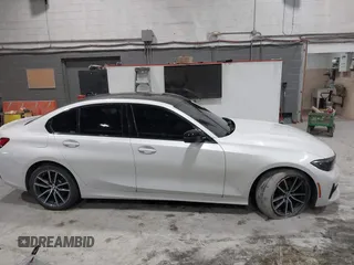 2019 BMW 3 Series 330i xDrive with VIN WBA5R7C55KAJ83482, listed as a IAAI auction lot 41565321 with 126,536 mi miles. Bid and sale history available at carsss.com. Image 13.