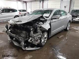 2018 Chevrolet Impala Premier with VIN 2G1125S36J9138869, listed as a IAAI auction lot 41207086 with 218,327 mi miles. Bid and sale history available at carsss.com. Image 2.