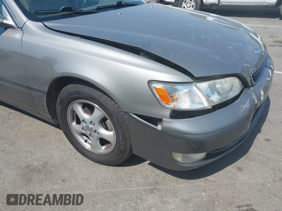 1998 Lexus ES 300 with VIN JT8BF28G3W5031533, listed as a IAAI auction lot 42132801 with 243,178 mi miles and . Bid and sale history available at DreamBid. Image 12.