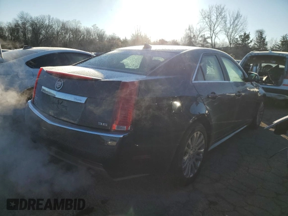 2013 Cadillac CTS with VIN 1G6DM5E36D0173553, listed as a Copart auction lot 84142504 with 100,703 mi miles and Salvage Title. Bid and sale history available at DreamBid. Image 3.