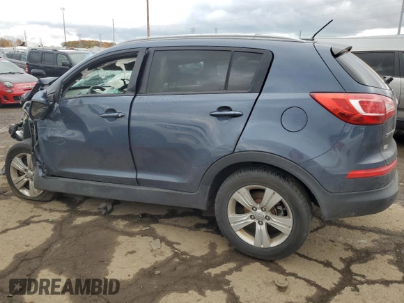 2012 Kia Sportage LX z VIN KNDPBCA28C7206947, wystawiony jako Copart lot #74242323 z przebiegiem Nie podano mil oraz Szkoda całkowita • Salvage title. Historia ofert i sprzedaży dostępna na DreamBid. Obrazek 2.