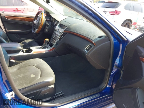 2012 Cadillac CTS Luxury with VIN 1G6DE5E59C0102621, listed as a IAAI auction lot 42554121 with 128,430 mi miles and . Bid and sale history available at DreamBid. Image 5.